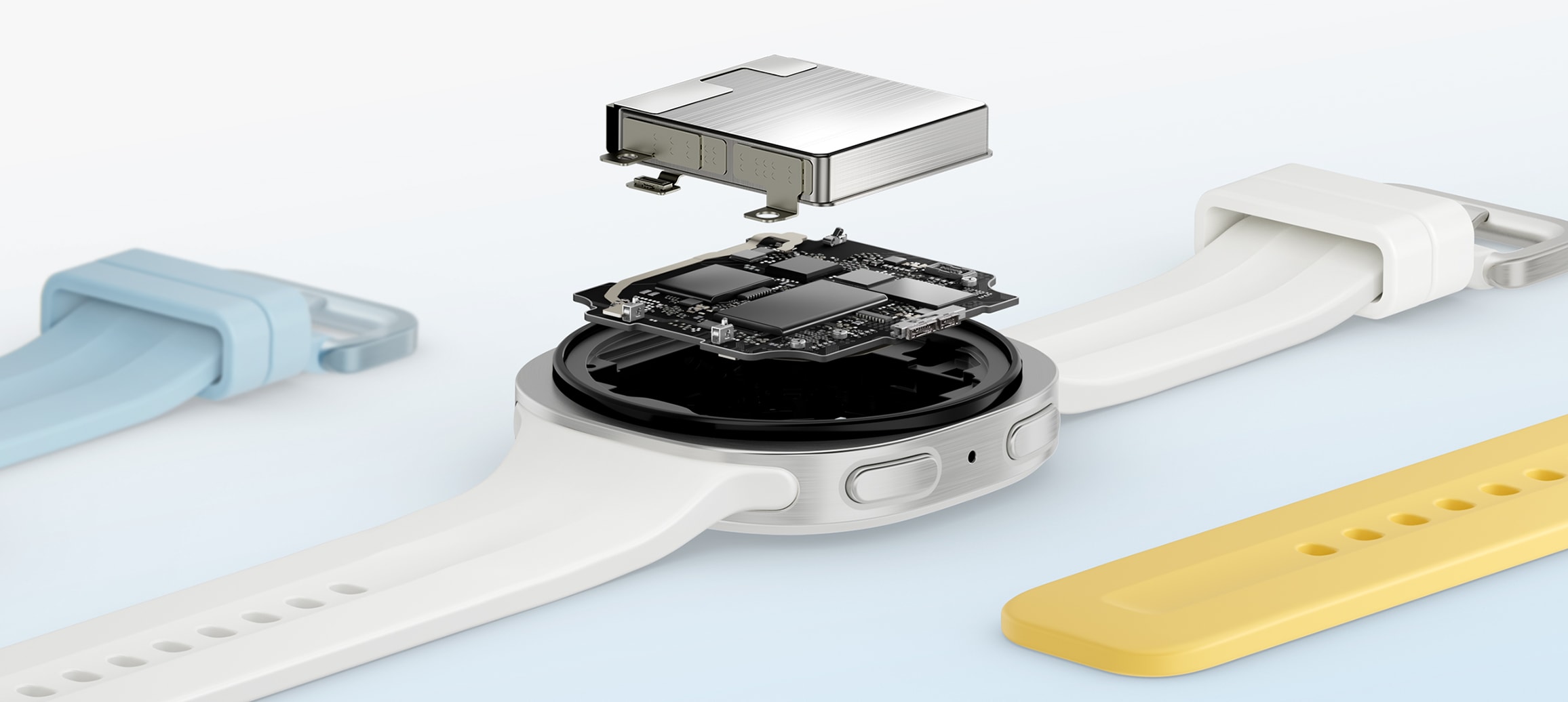 画面呈现搭配一条白色运动表带的远空银色Galaxy Watch9，手表表壳朝下平放，机身内部精密机芯组件以特写镜头完整展露，手表电池置于表体上方。这一画面着重展现电池容量升级优势，可为用户日间多类日常使用、夜间休息全程提供可靠长效的电力供给。画面中，一条蓝色运动表带与一条黄色运动表带环绕手表陈列展示。