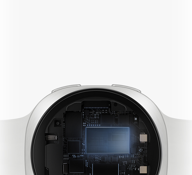 画面展示了一块Galaxy Watch9，这款手表搭配了一条白色运动表带，机身内部组件以特写镜头清晰呈现。展示其具备快速的运行性能，可保障日常多任务处理与锻炼跟踪场景下的高校响应，操作流程更为流畅高效。
