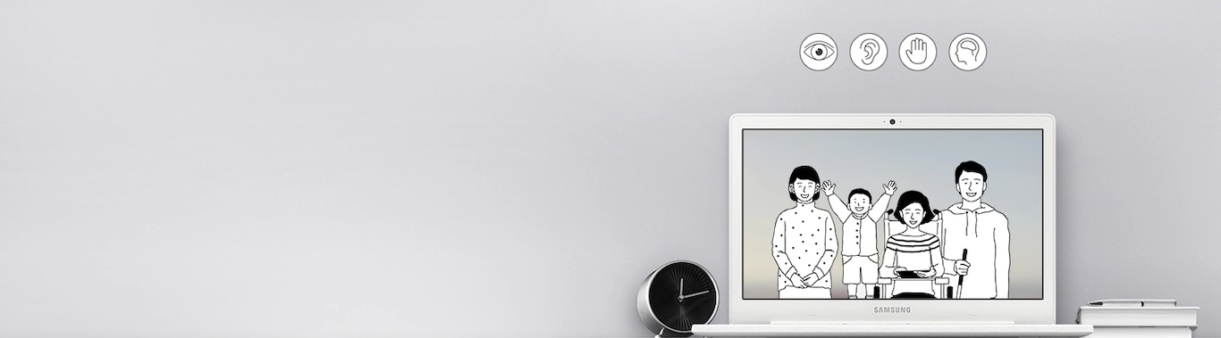 A laptop screen shows 2 women, 1 man and 1 boy who are all disabled together in a row smiling, above the screen the eye, ear, hand and brain icon are displayed.